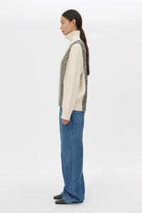 Side view CAMILLA AND MARC Tusk Detail Knit Turtleneck in Black with contrast jacquard stripe and Australian wool.