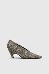 Side ghost view CAMILLA AND MARC Wave Spotted Pump in Black and White with textured finish and angled heel.