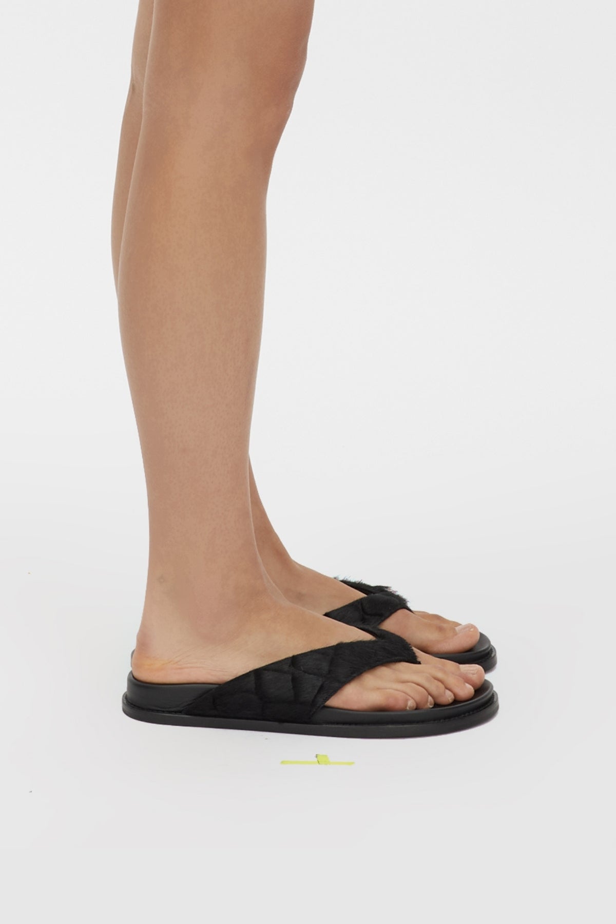 Side view CAMILLA AND MARC Zita Pony Croc Sandal in Black on foot. 