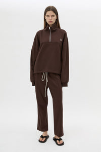 Front view CAMILLA AND MARC Zylus funnel neck pullover sweater in chocolate/white with contrast embroidered monogram.