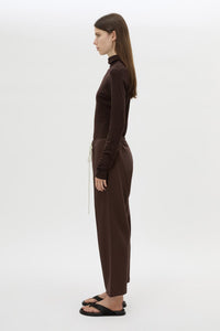 Side view CAMILLA AND MARC Zylus straight-leg tracksuit pant in chocolate with embroidered monogram.