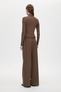 Back view CAMILLA AND MARC Axial Top in Chocolate with layered cross‑over high neck.